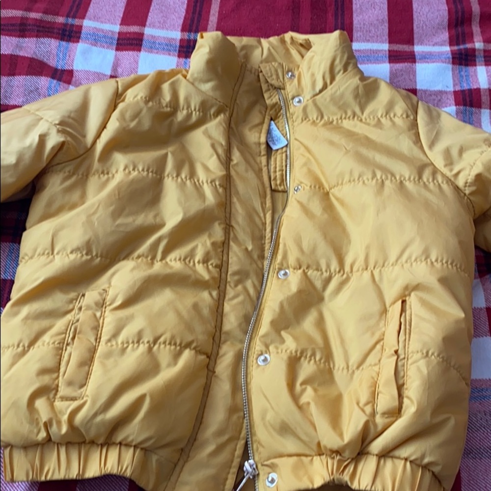 Yellow puffer jacket